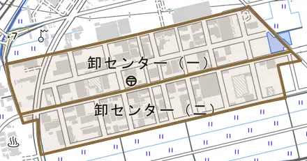 卸センターとその周辺の地図。町の範囲を重ねている