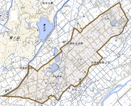 丹原町北田野とその周辺の地図。町の範囲を重ねている
