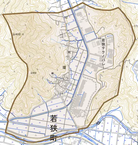 堤とその周辺の地図。町の範囲を重ねている