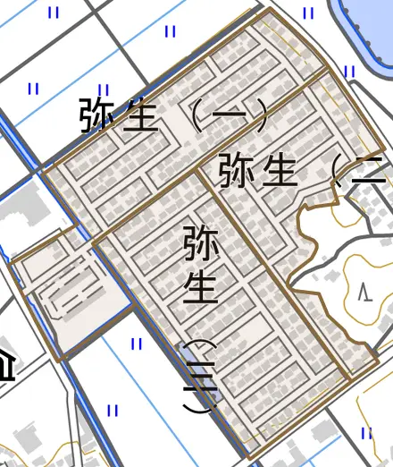 弥生とその周辺の地図。町の範囲を重ねている