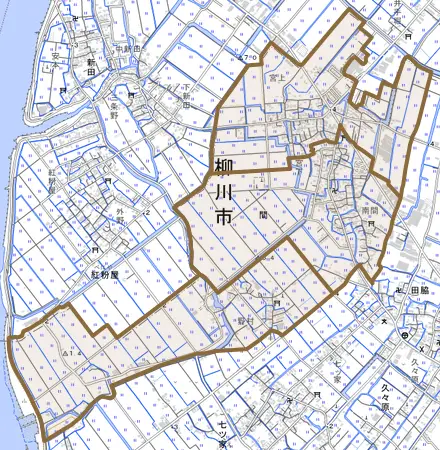 間とその周辺の地図。町の範囲を重ねている
