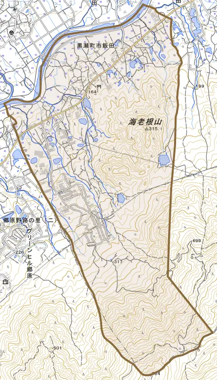 黒瀬町市飯田とその周辺の地図。町の範囲を重ねている