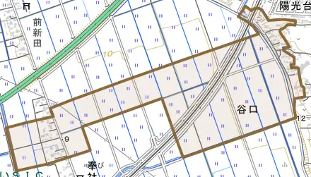 谷口とその周辺の地図。町の範囲を重ねている