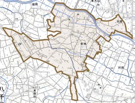 大字新地とその周辺の地図。町の範囲を重ねている