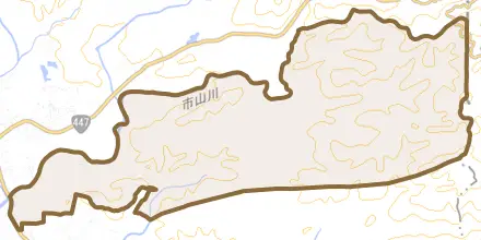 菱刈市山とその周辺の地図。町の範囲を重ねている