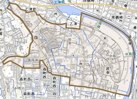 大字皆春とその周辺の地図。町の範囲を重ねている