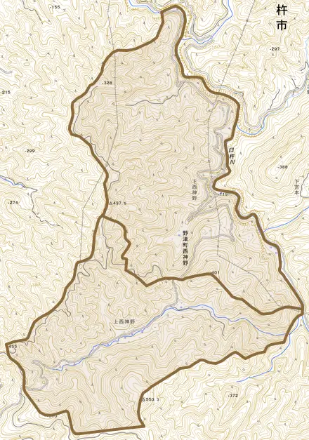 野津町大字西神野とその周辺の地図。町の範囲を重ねている