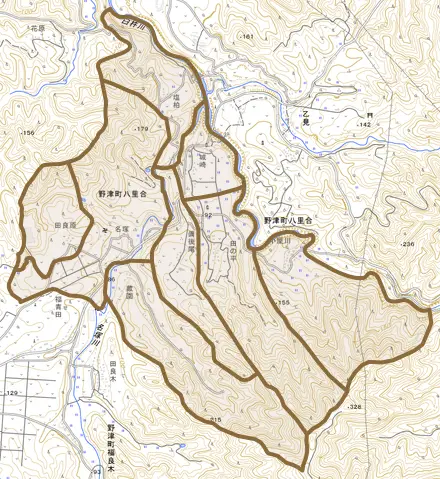 野津町大字八里合とその周辺の地図。町の範囲を重ねている
