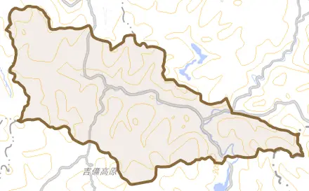 吉永町都留岐とその周辺の地図。町の範囲を重ねている