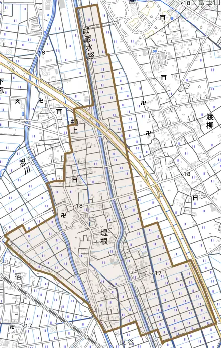 大字堤根とその周辺の地図。町の範囲を重ねている