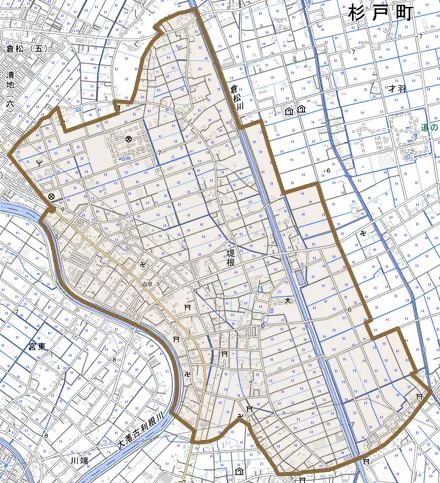 大字堤根とその周辺の地図。町の範囲を重ねている