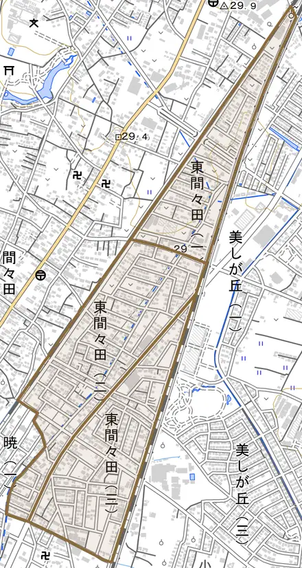 東間々田とその周辺の地図。町の範囲を重ねている