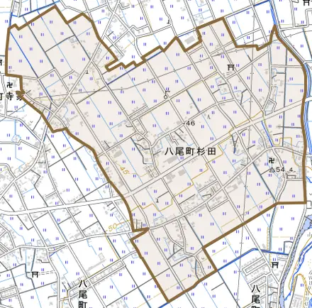 八尾町杉田とその周辺の地図。町の範囲を重ねている